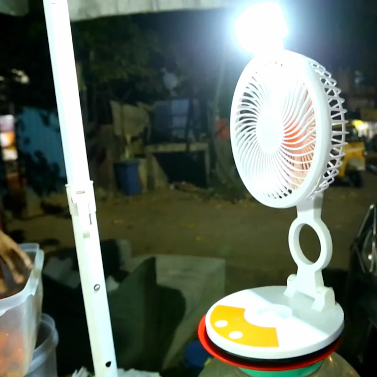 RECHARGEABLE TABLE FAN WITH LED LIGHT.